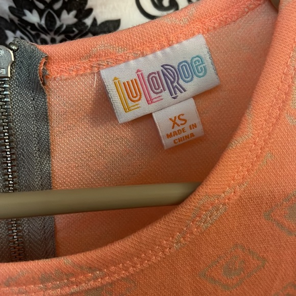 Cream designs over peach/neon orange.-DONATED - Picture 2 of 9